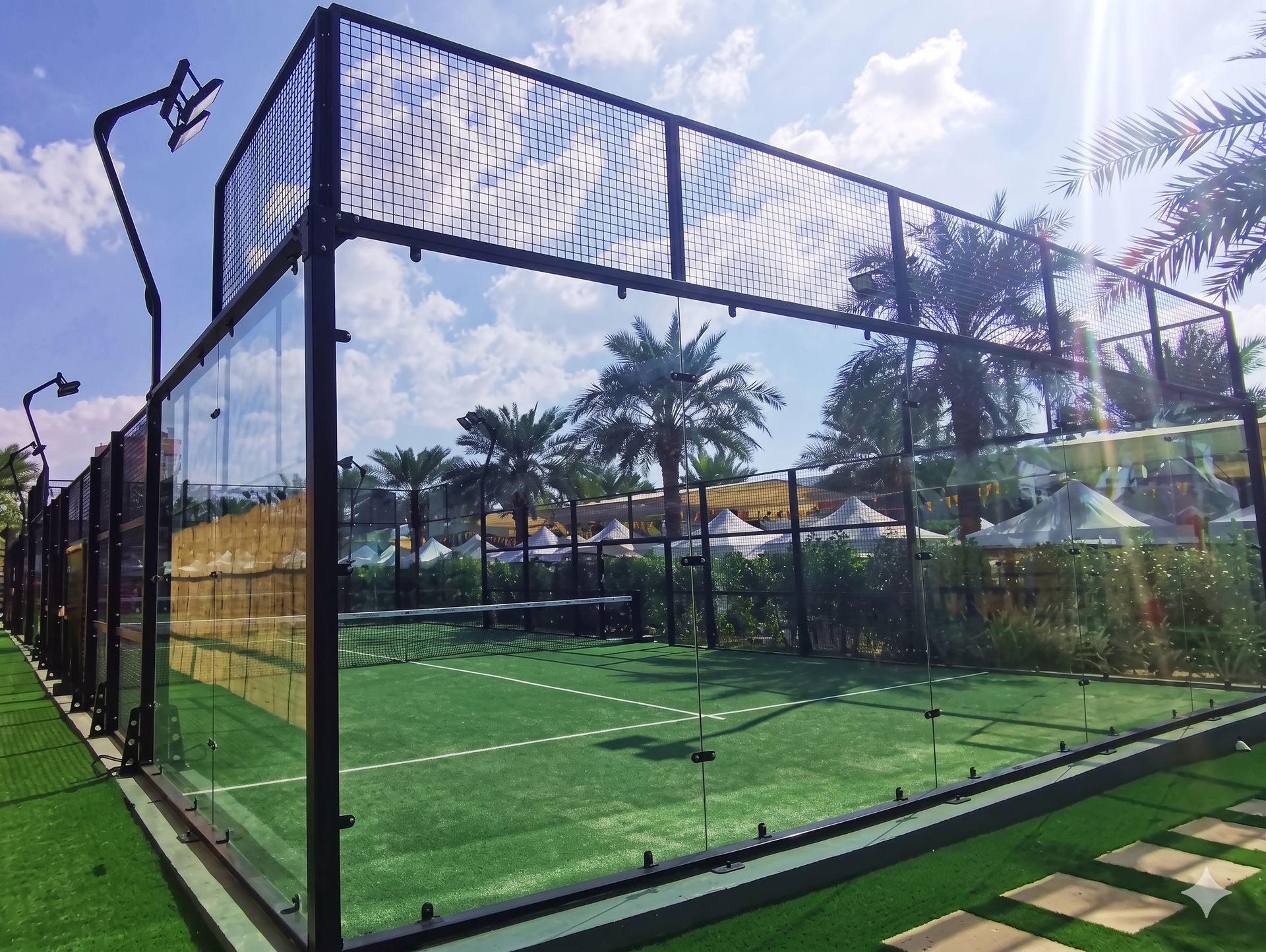 Padel court and players in action