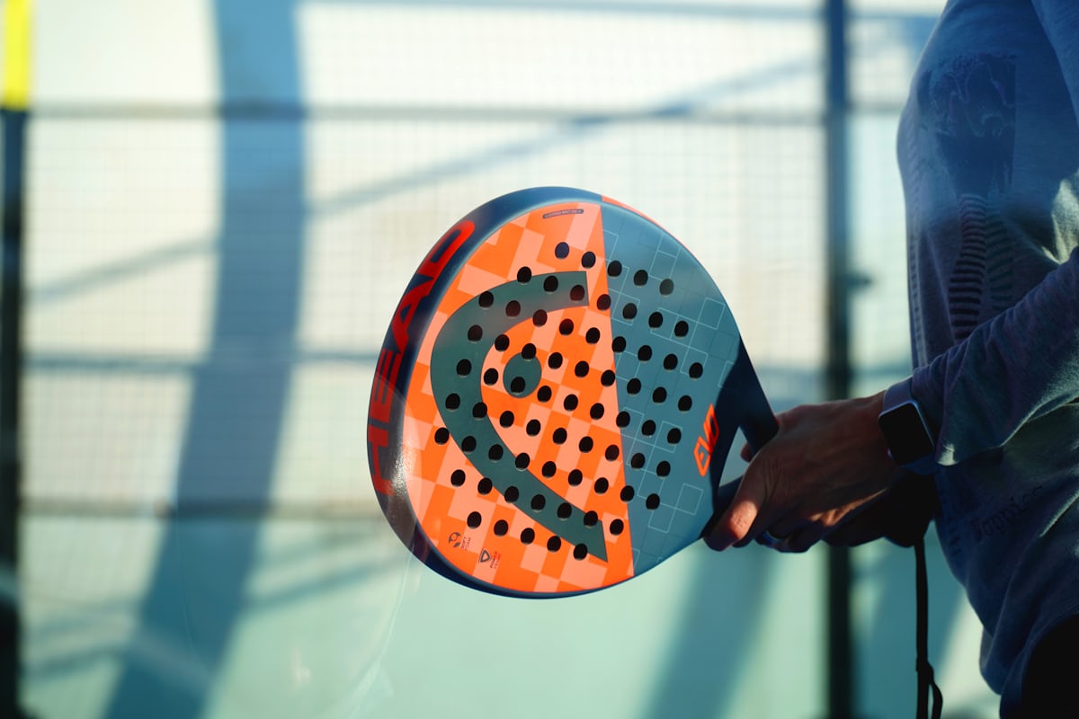 Players enjoying padel at a club